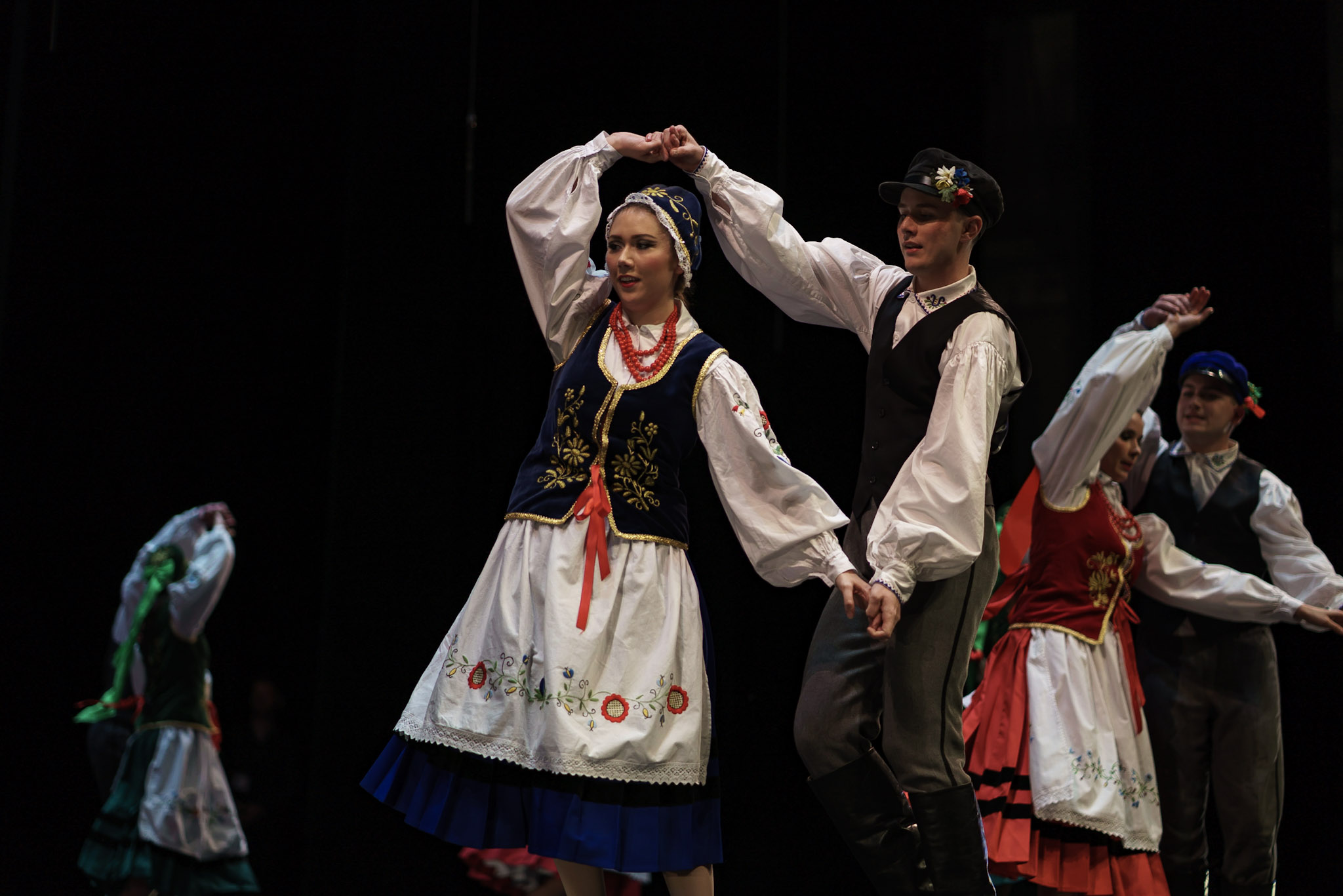 The Kaszuby dances are from the Baltic area of Poland and are mostly gentle, joyful, and graceful. Although they have many characteristic traits of the dances from the neighbouring regions, they also reveal obvious Swedish and German influences both in music and in the steps. They can be divided into dances of the rural population and of people of the sea.